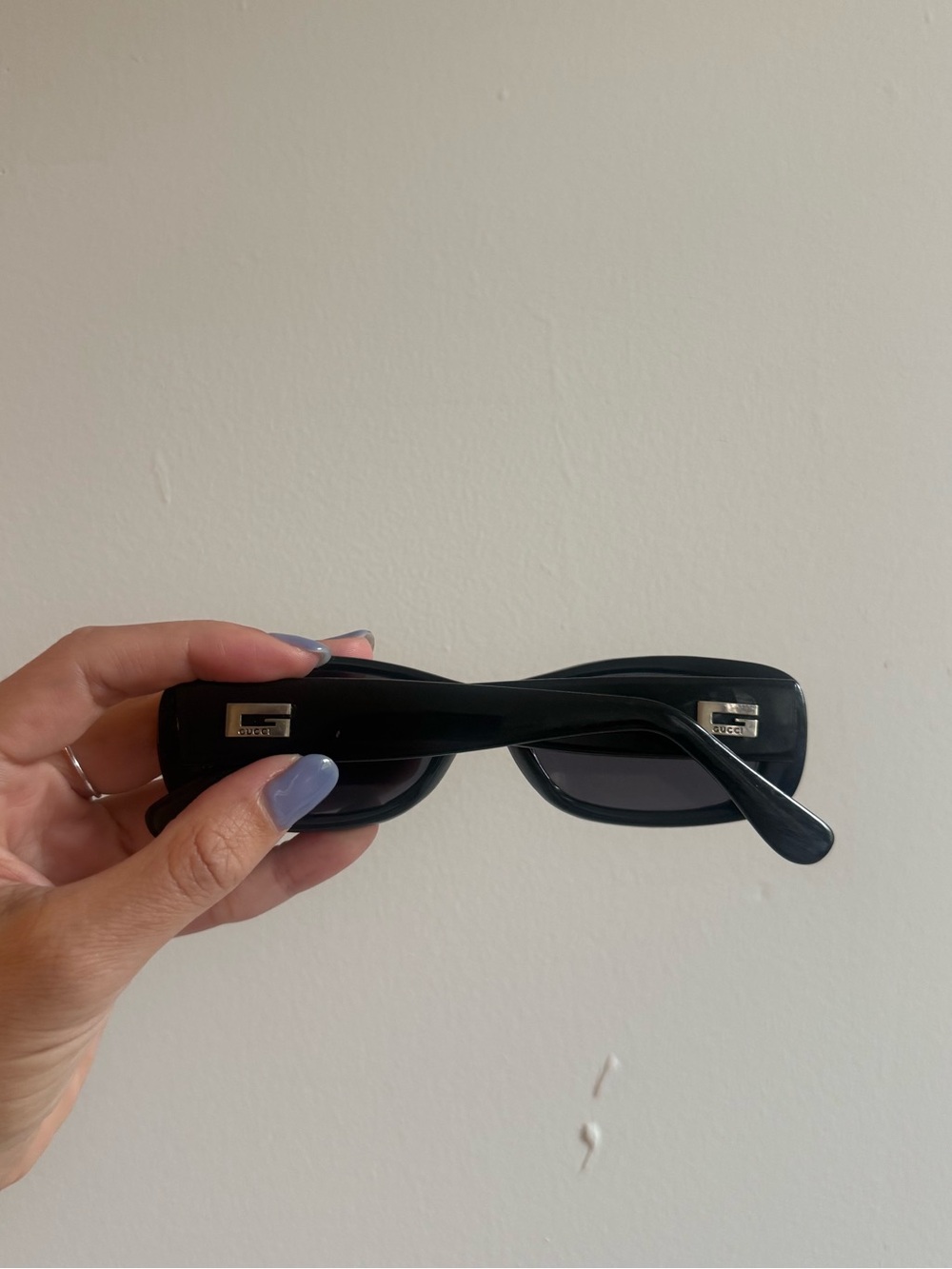 Gucci black rectangular sunglasses with silver logo